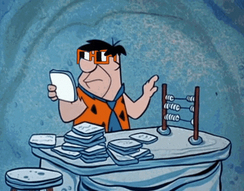 Fred Flintstone counting up on an abacus. A joke to reference working out the cost of living related to relocating to the Netherlands.